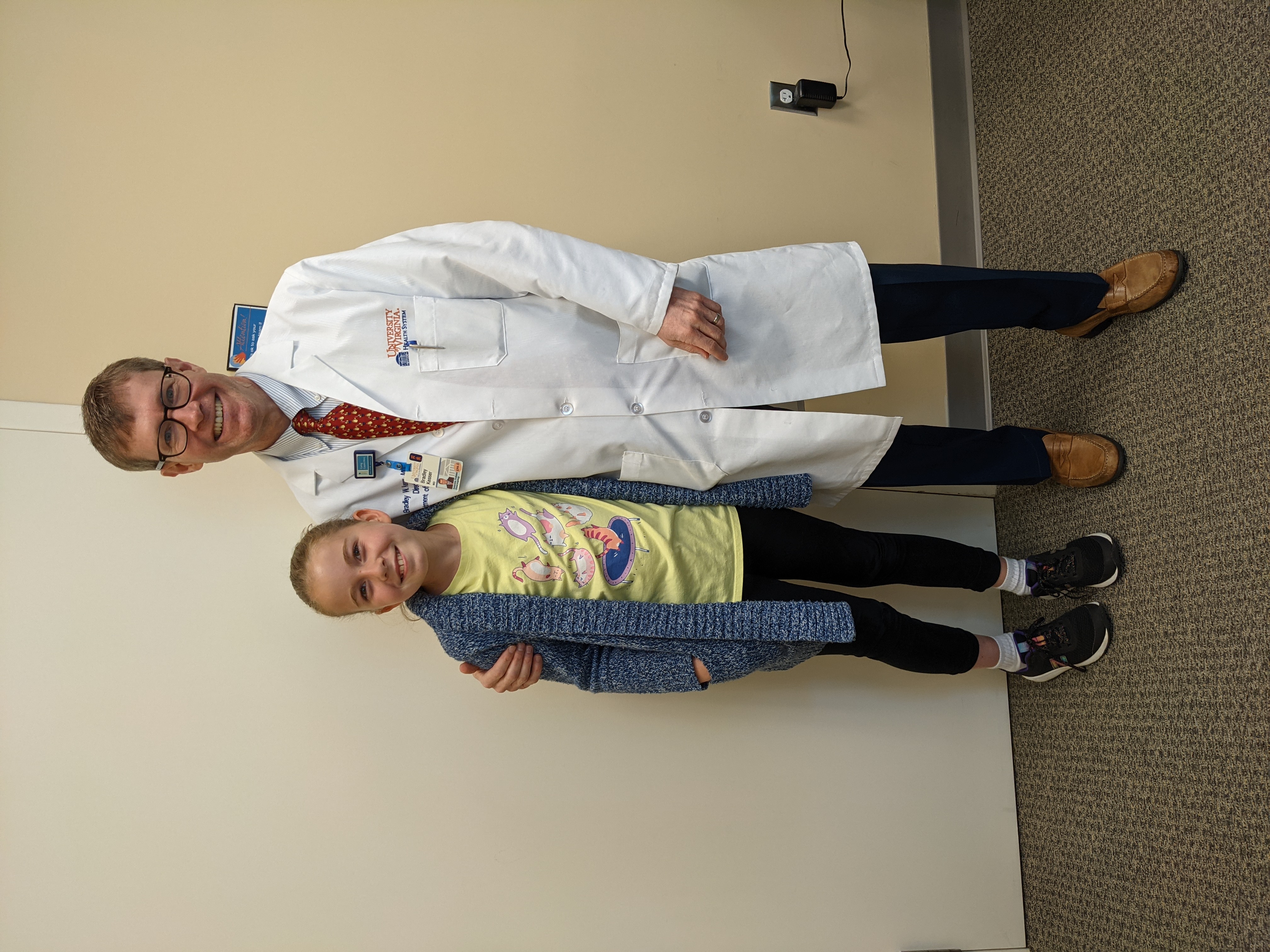 Hannah stands next to Dr. Kessser