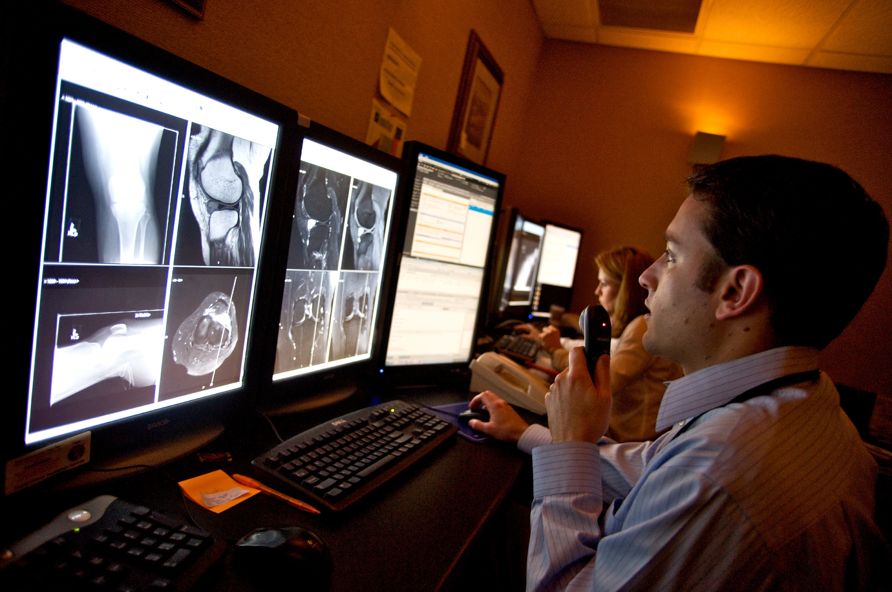 UVA residents in the lab reviewing scans. 