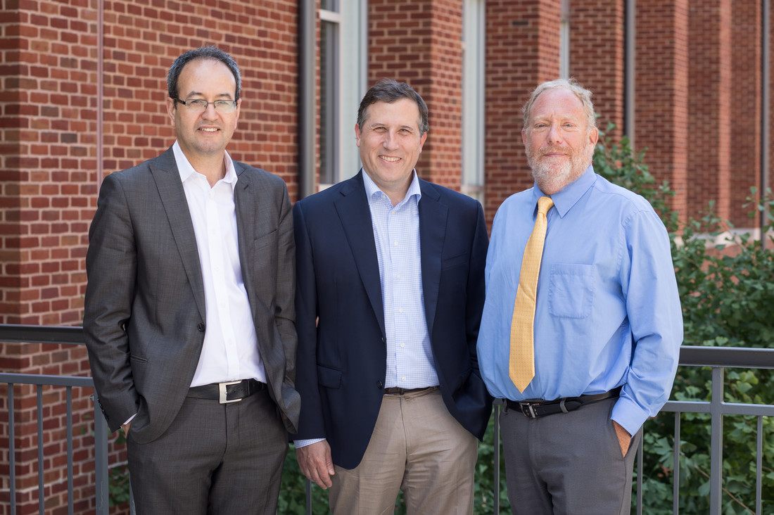 Left to right, David Goodman, Mustapha Kandil, a senior director at Pharmascience, and Mark Kester, stand together following a lab tour at UVA.