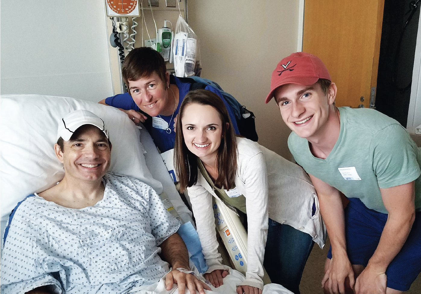 James Hiter lies in a hospital bed surrounded by his sister, daughter, and son.