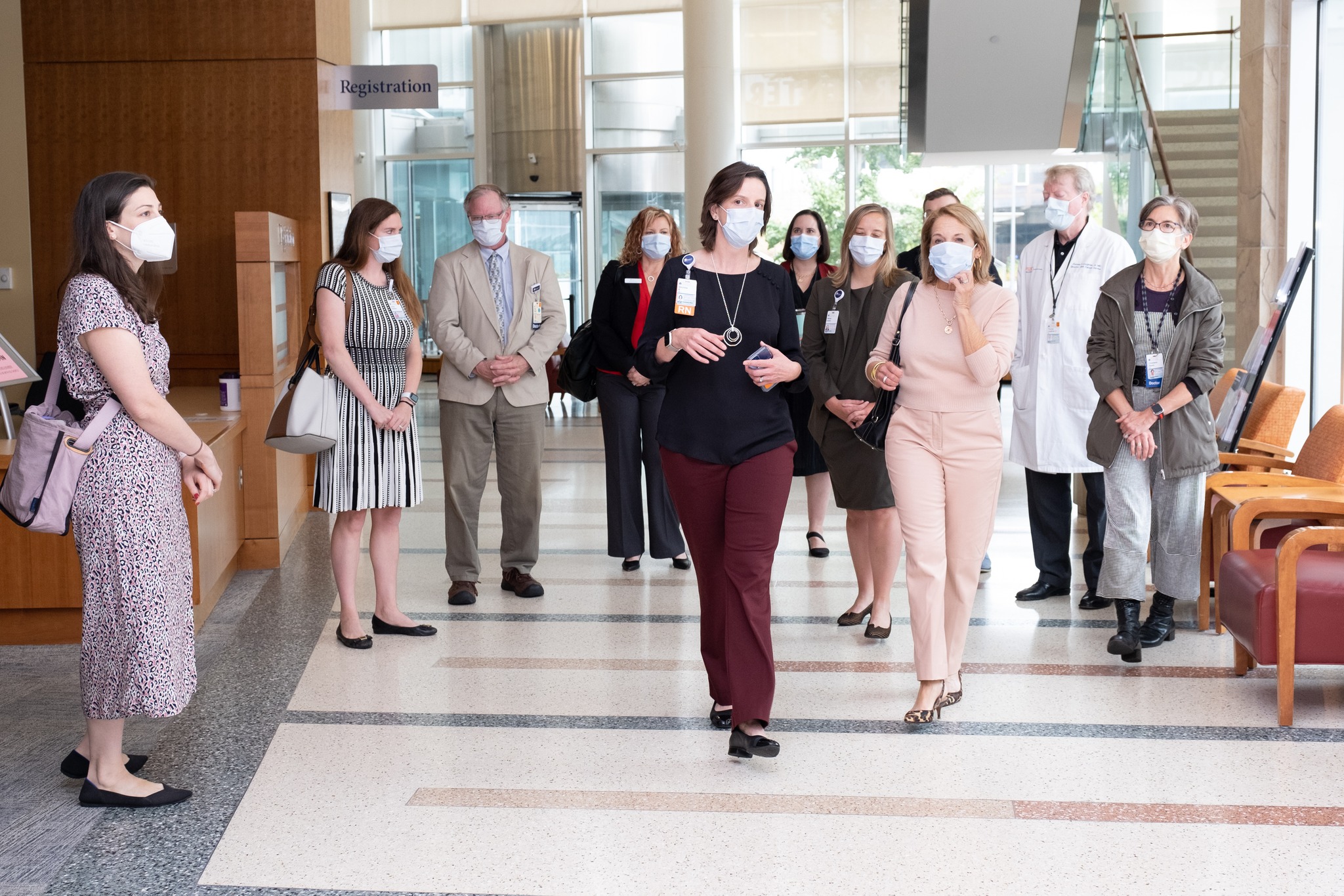 Katie Couric walking through the cancer center