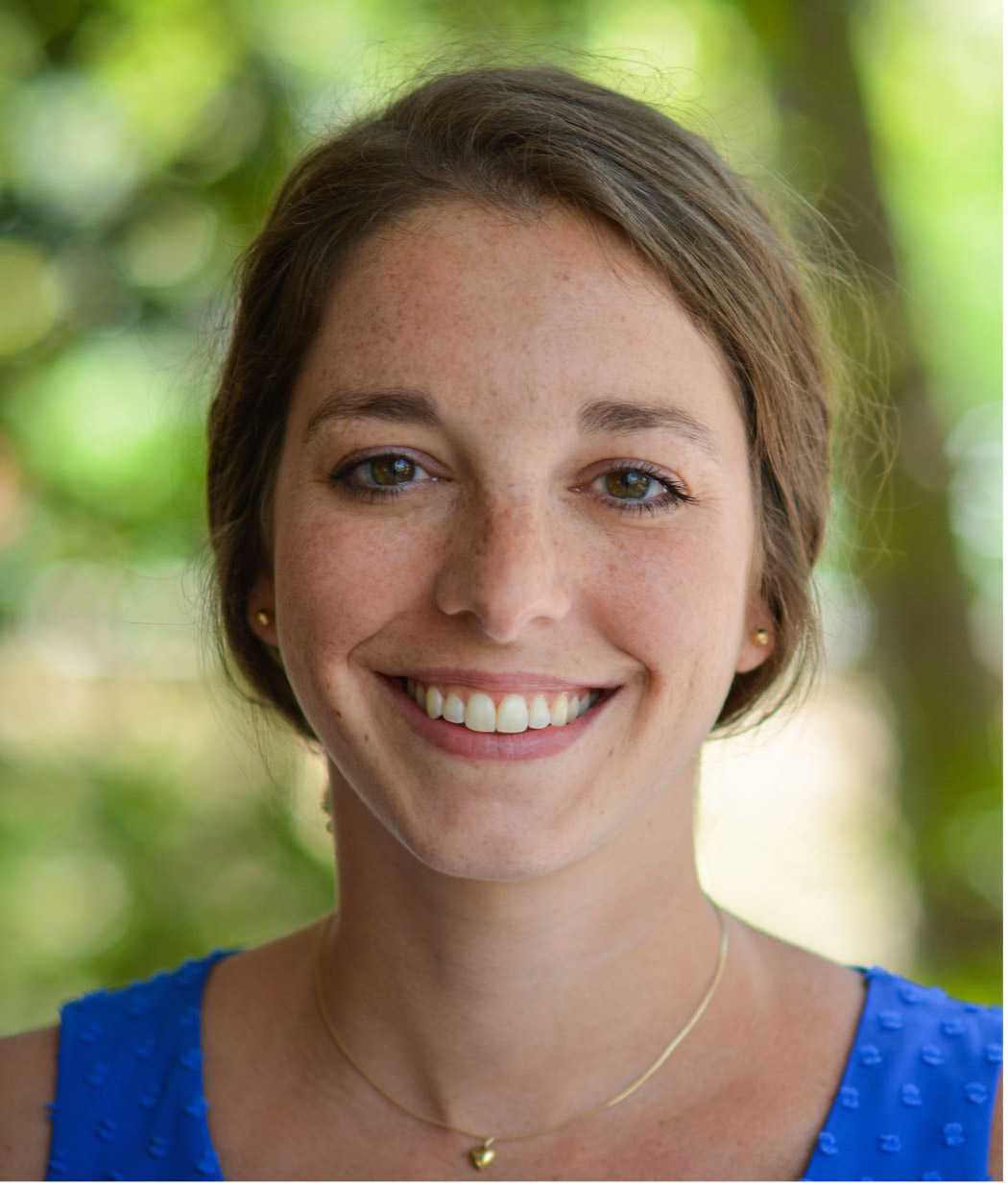 Meghan Puglia, PhD smiles in her headshot