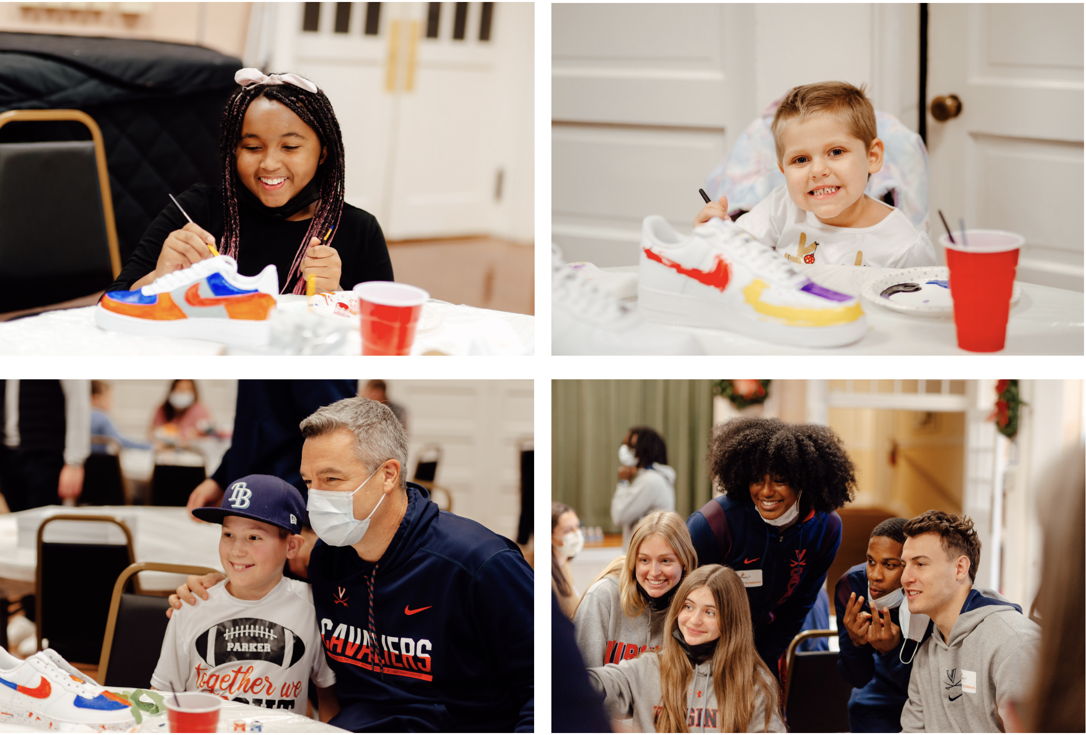 children sitting at tables painting shoes and smiling with UVA basketball players