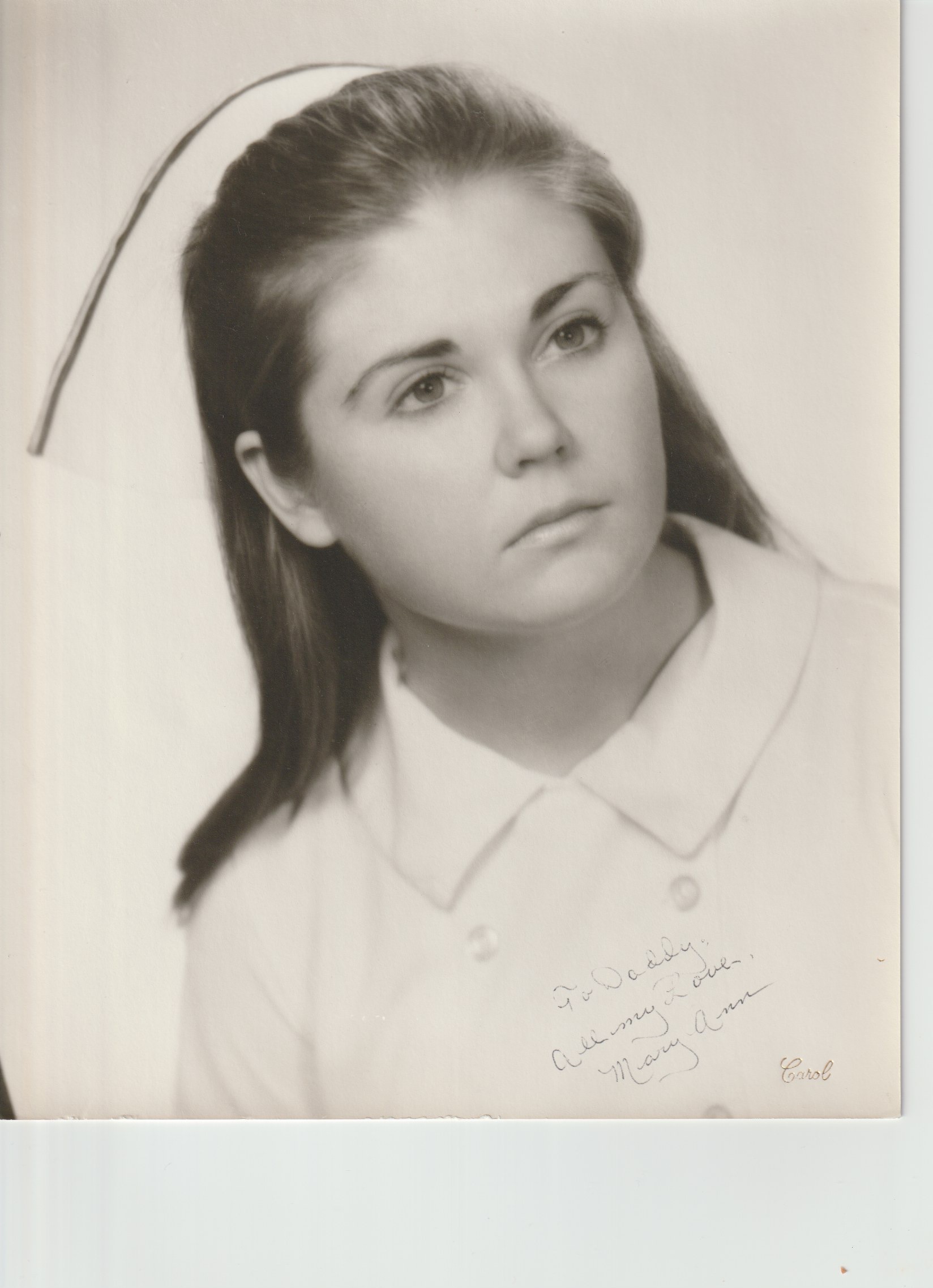 a black and white headshot of Mary Ann from her time in school 