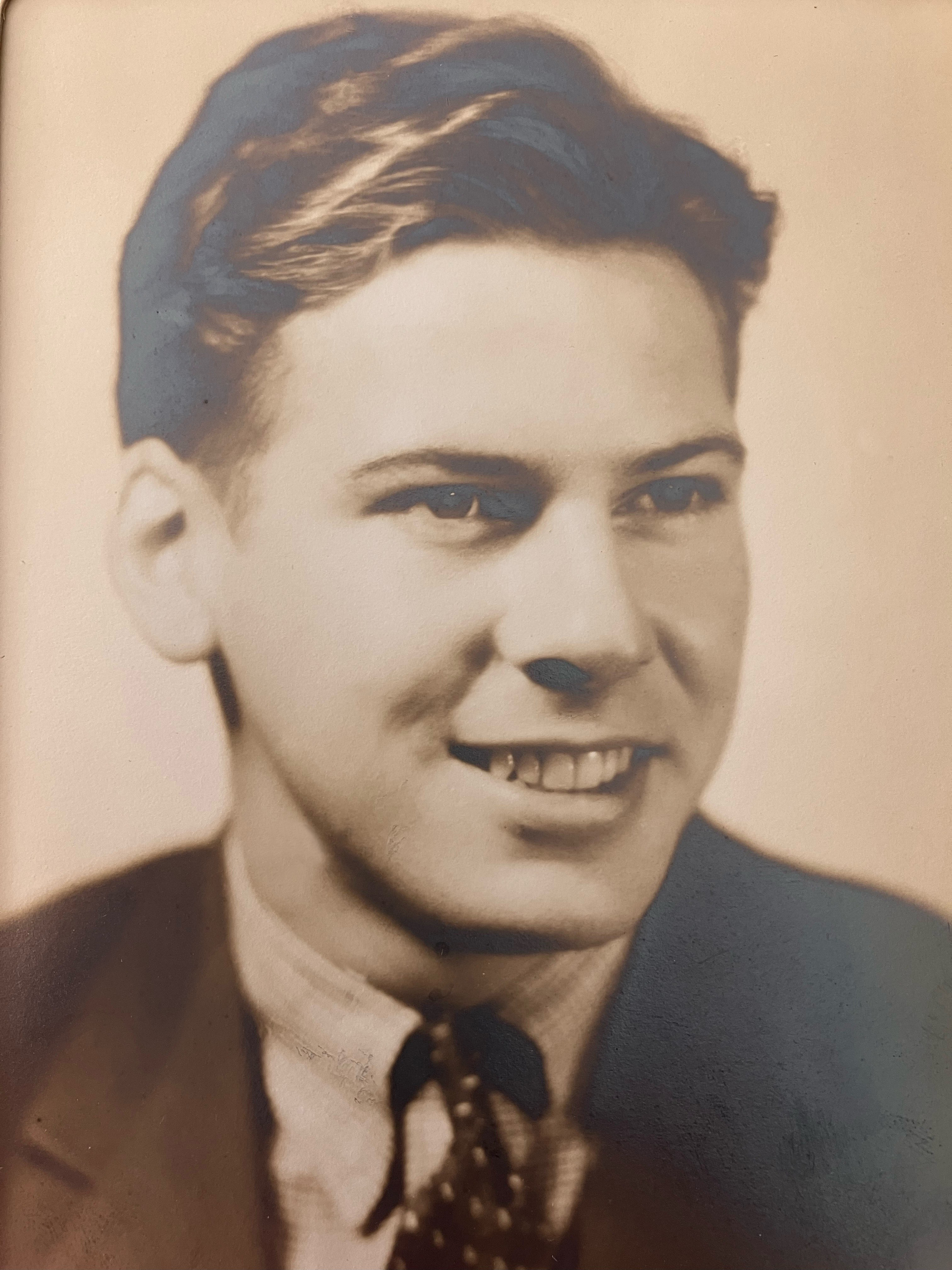 a black and white headshot of a young man, Alan Sim