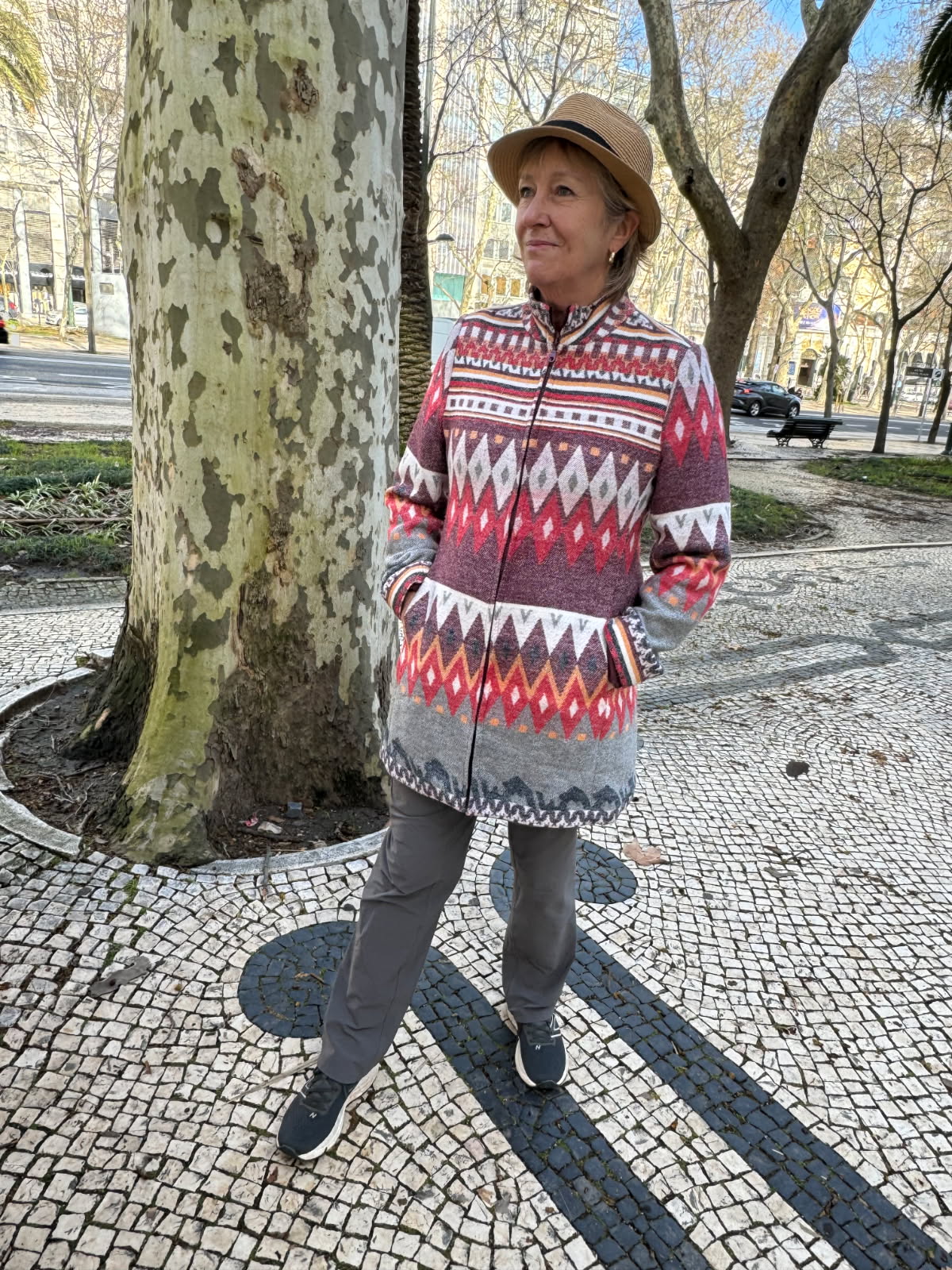 Carol Wise stands outside looking into the distance