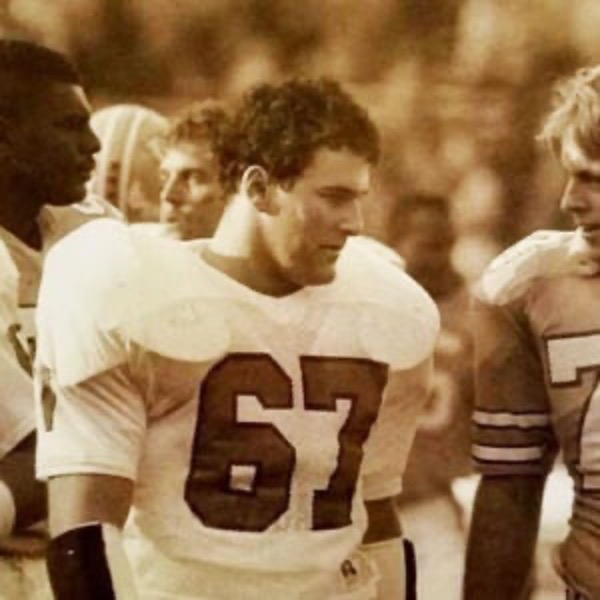 Mike in his college football uniform