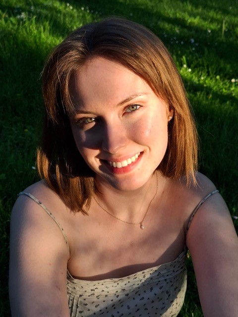 Headshot of Emma Raper smiling 