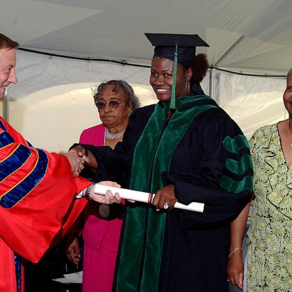 LaTonya Russell accepts her diploma