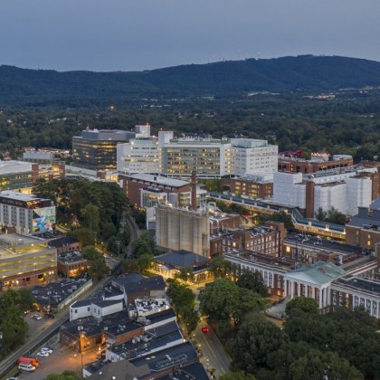 Drone shot of uva health at night 