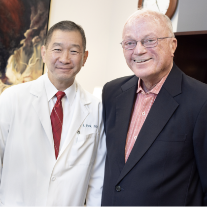 Dr Park and Jack Reid stand side by side