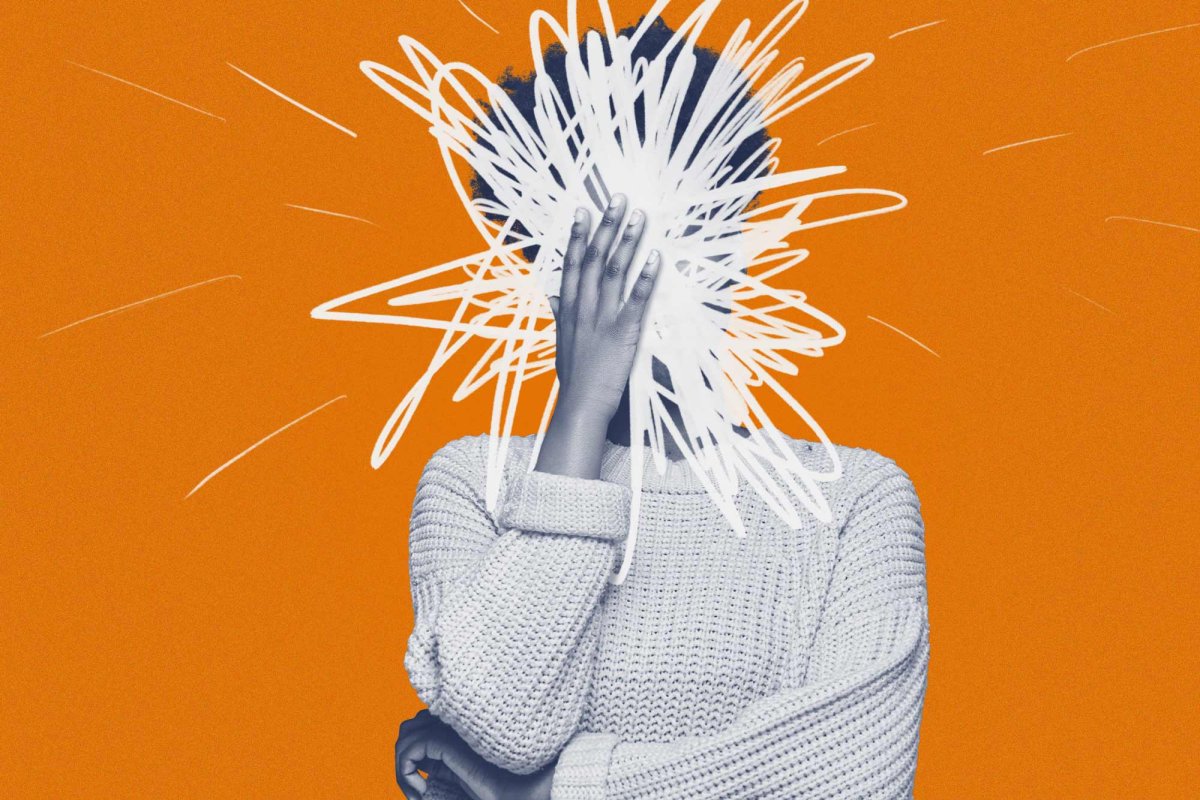 image of person with hand over their face