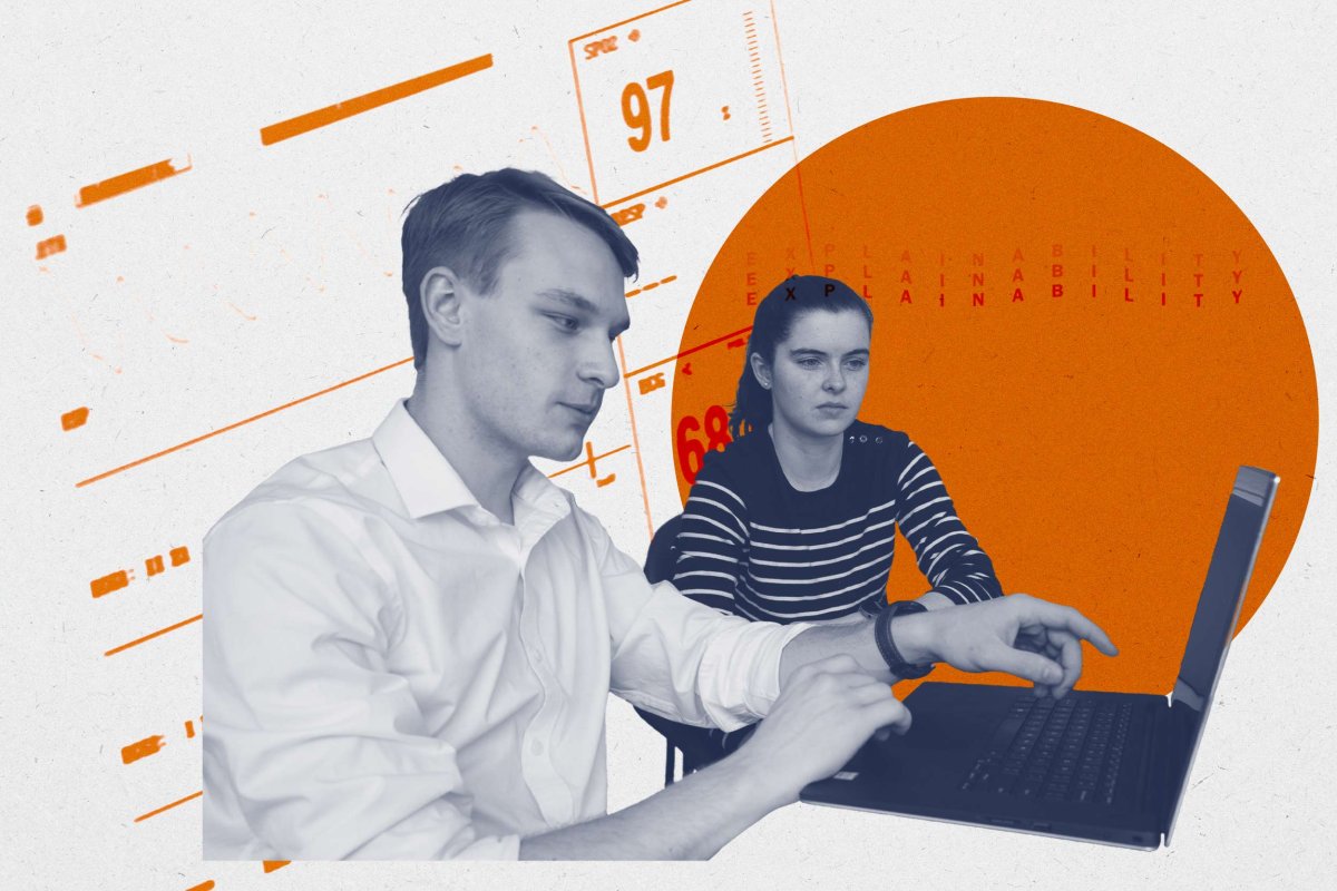 Zachery Boner and Louisa Edwards work on their computer