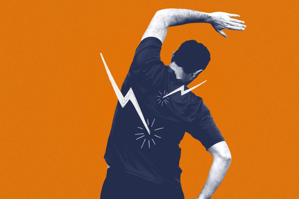 view of a man from behind stretching his back