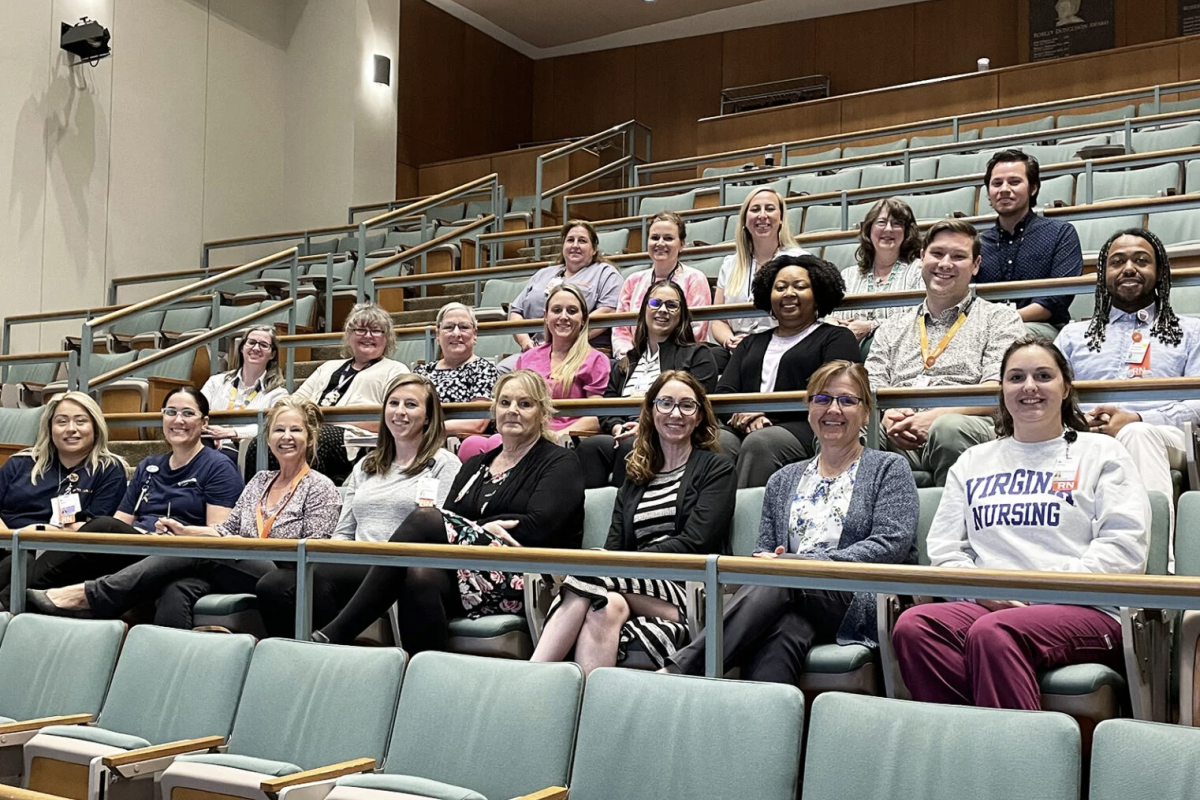 nursing students sit in auditorium 