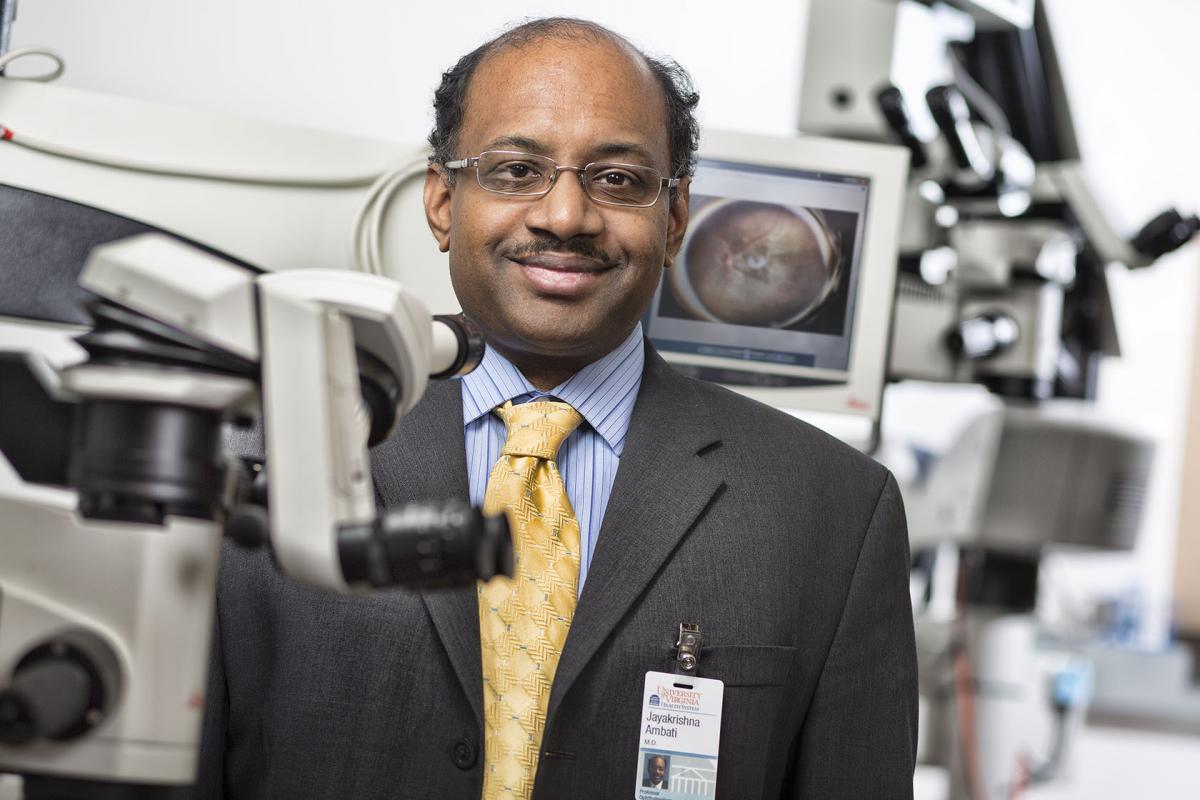 Headshot of Dr. Ambati in his lab.