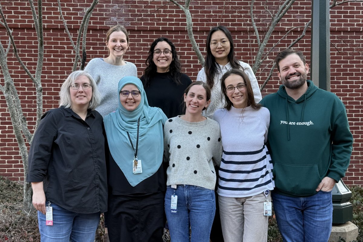 Members of the Anderson lab stand together outside