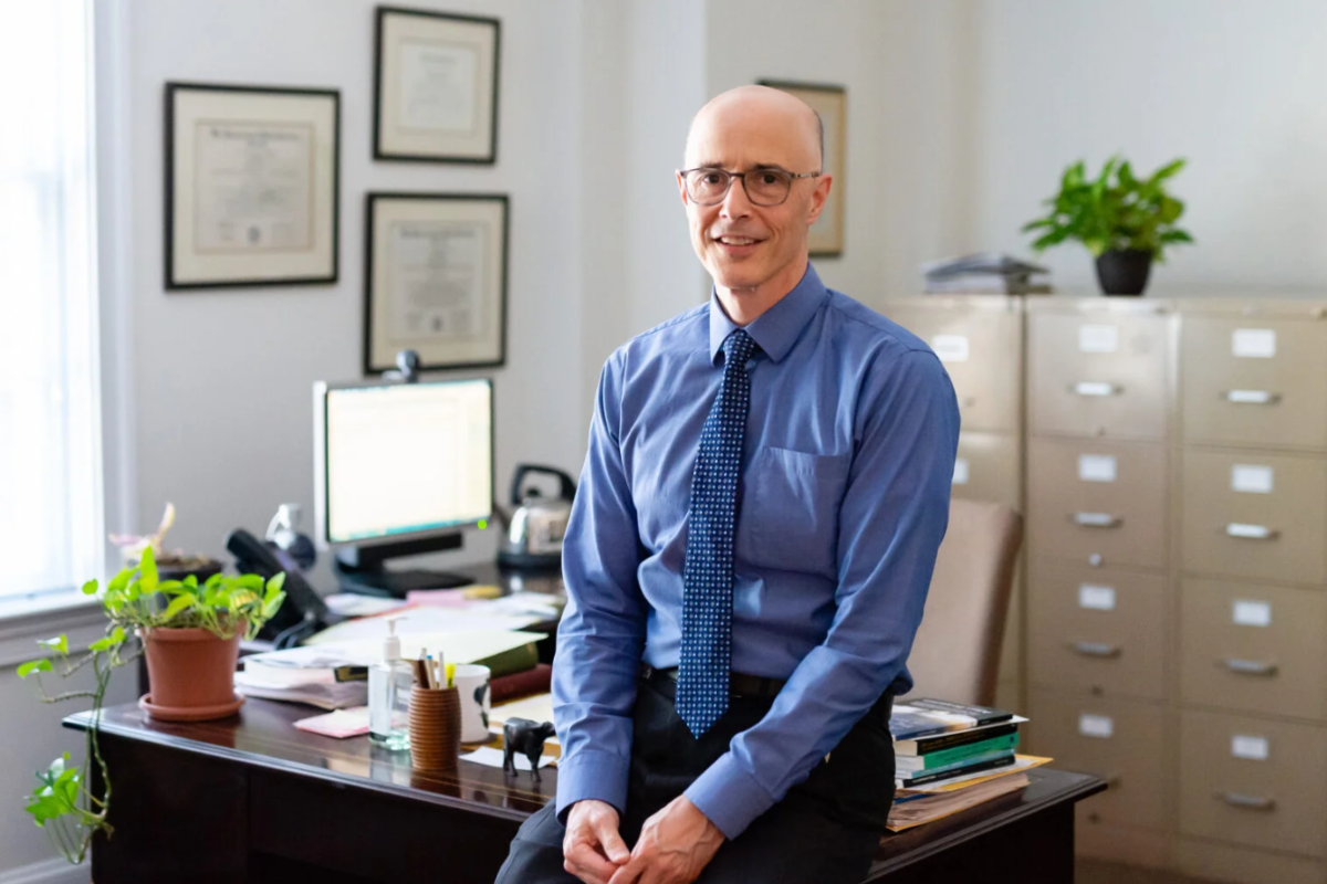 Jim sits in his office