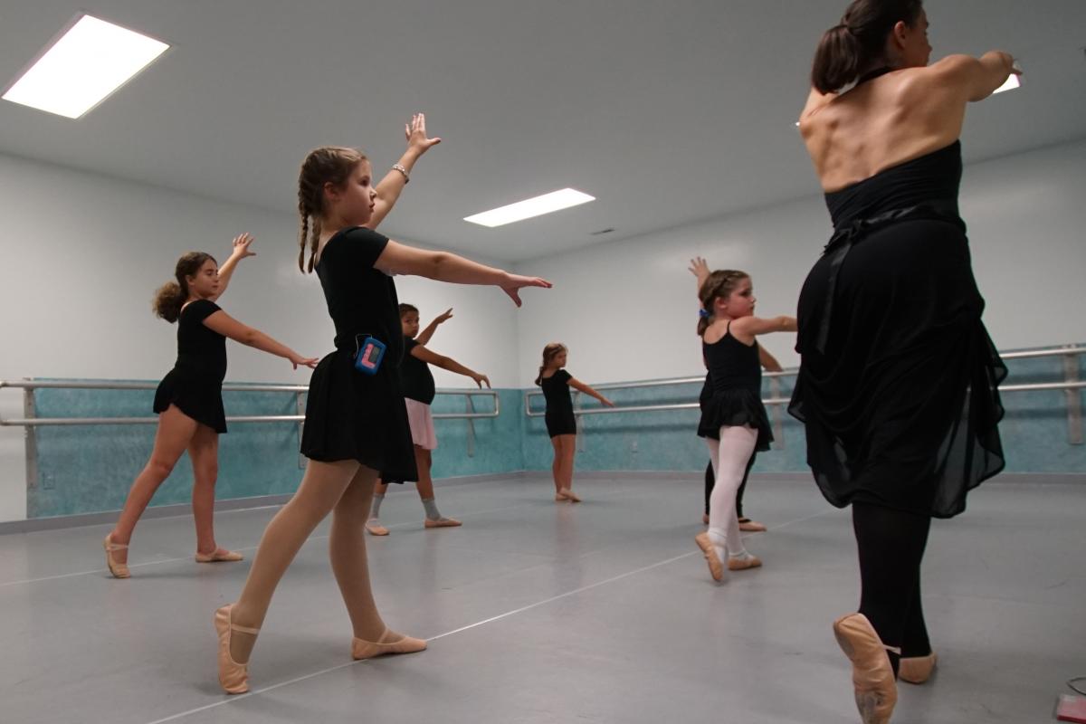 Chloe Jarrat, who participated in a clinical trial of the artificial pancreas, wearing the device during her ballet class.