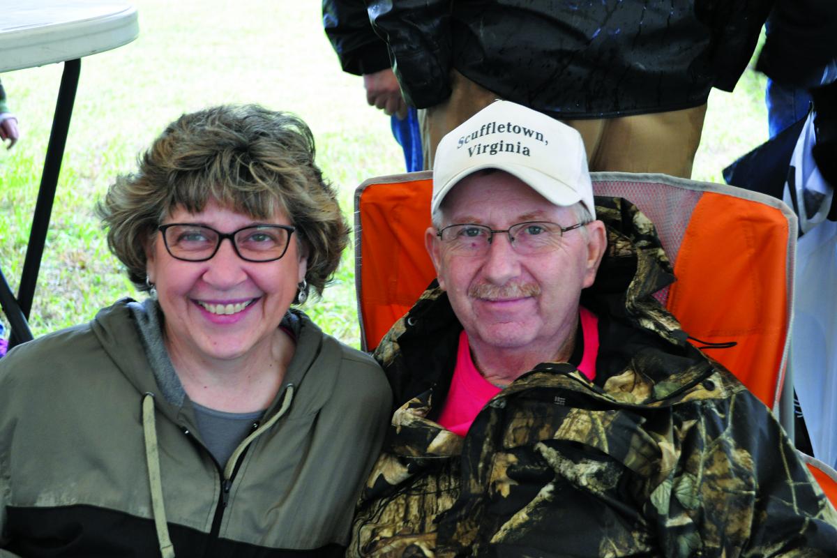 Tamara and Daryl Bennett sit and smile