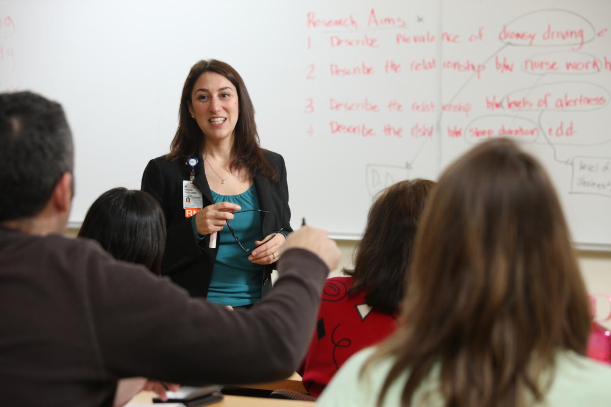 UVA Associate Professor of Nursing Pamela B. DeGuzman teaches a class.