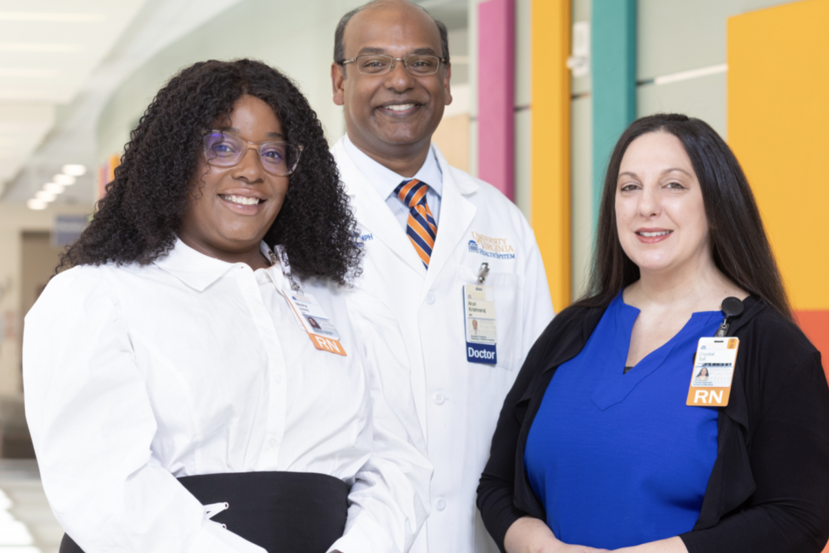 Mesha Lawan Jones,  Arun Krishnaraj, and Crystal Toll stand beside eachother