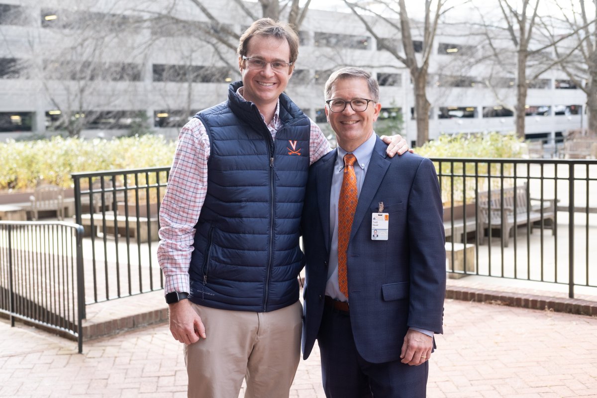 Peter Farrell with Todd Bauer, MD, chief of the division of surgical oncology. (Photo: Coe Sweet) 
