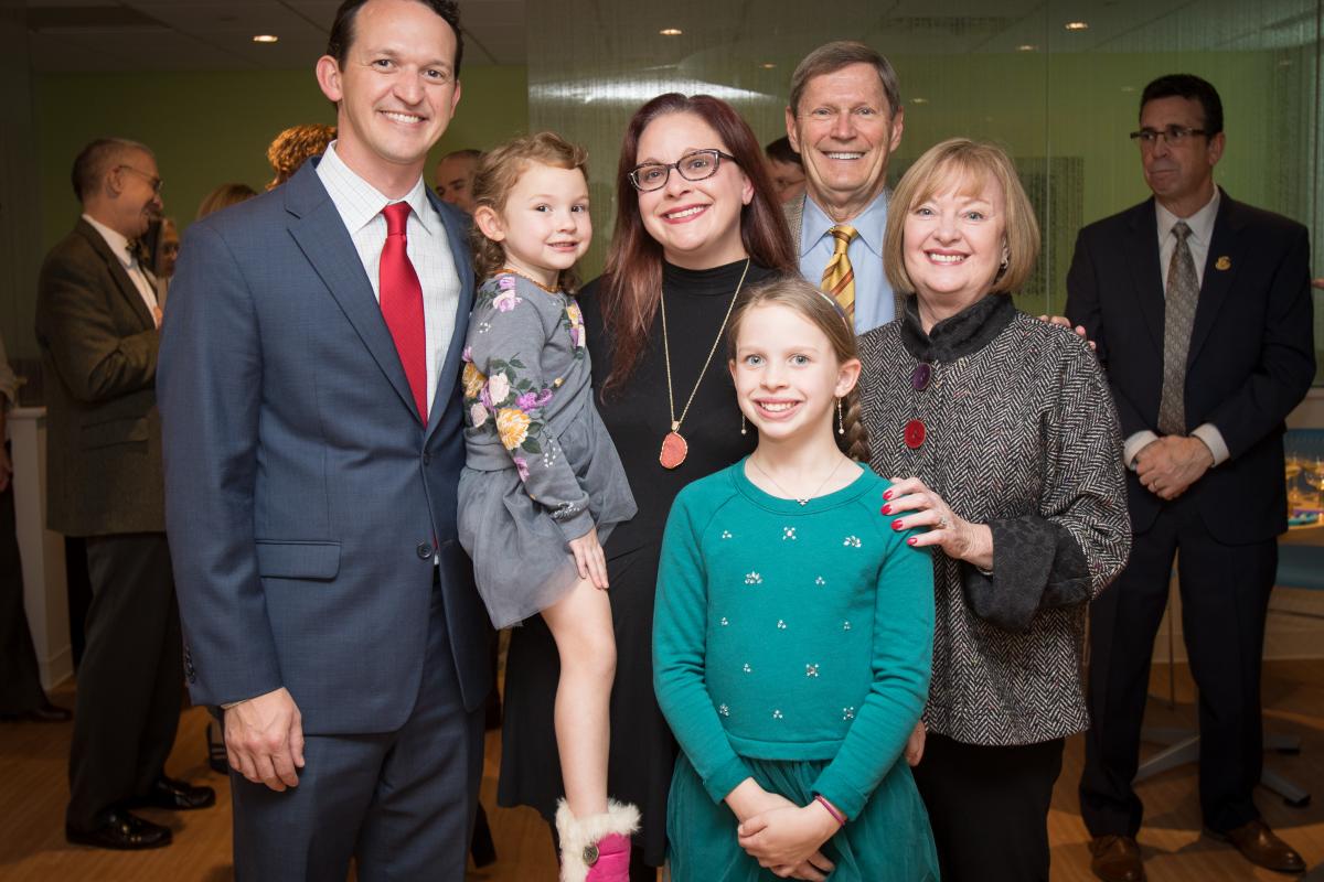 Adam and Kelly Jackson (L) with Rick and Rosemary Postle (R)